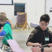 Students build their wings with the help of GVSU Staff